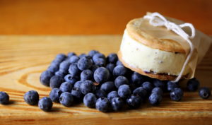 ice cream sandwich on tea cookies with blueberry compote